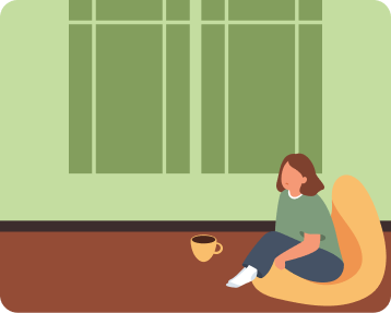 A women sitting on a sofa and thinking with a cup of coffee kept beside her
